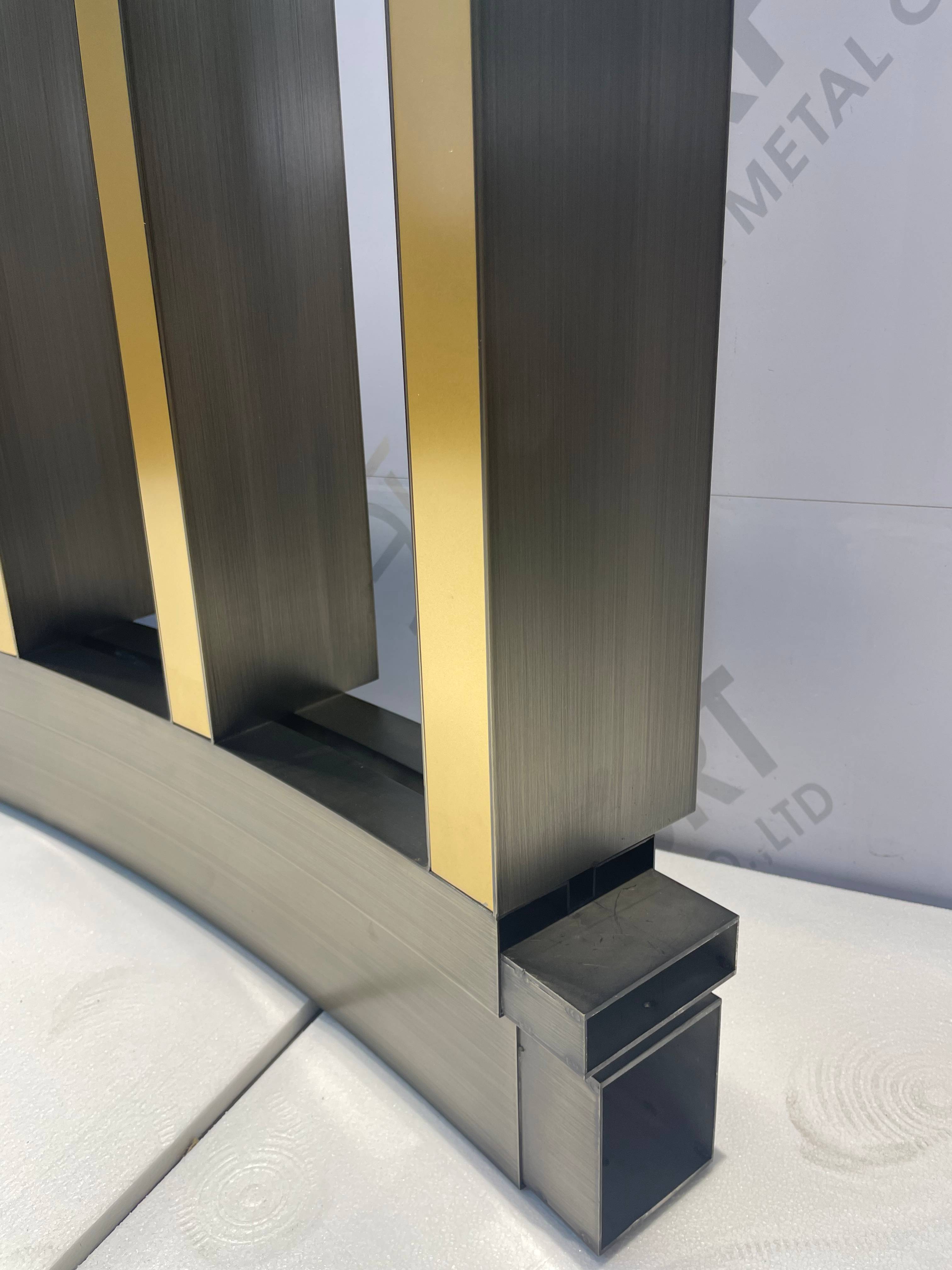 STAINLESS STEEL ARC DESIGN BRONZE AND GOLD HAIRLINE ROOM DIVIDER FOR HOTEL LOBBY
