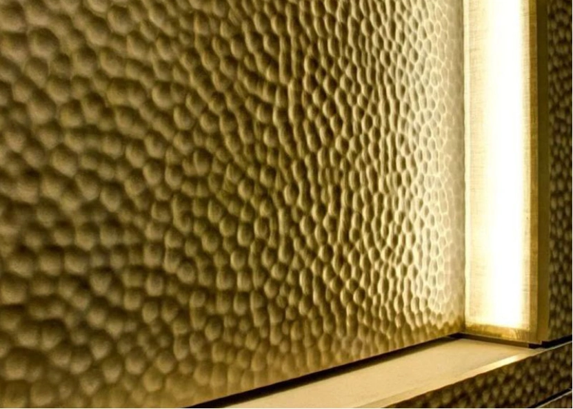 Hammered metal surfaces