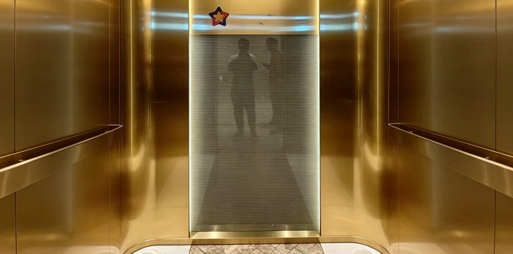 gold-stainless-steel-elevator-interior